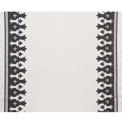 Ivory textile with black vertical borders along both sides, featuring repeating bird/floral silhouettes.