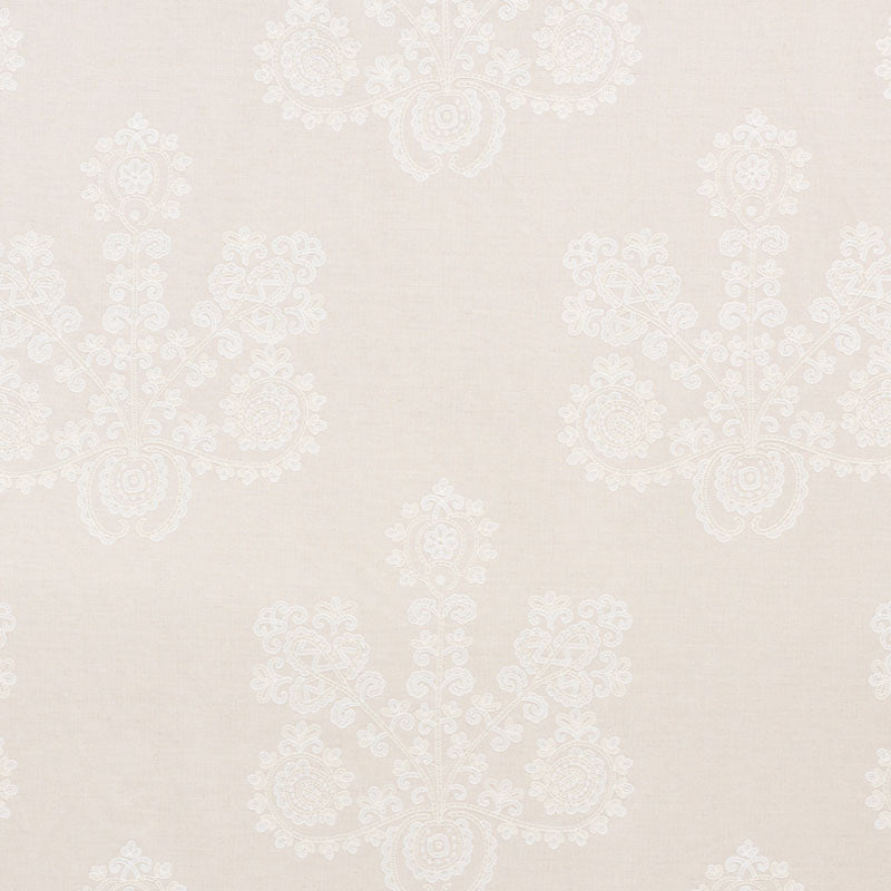 Beige damask wallpaper with subtle white floral motifs; classic, elegant wall covering for living spaces.