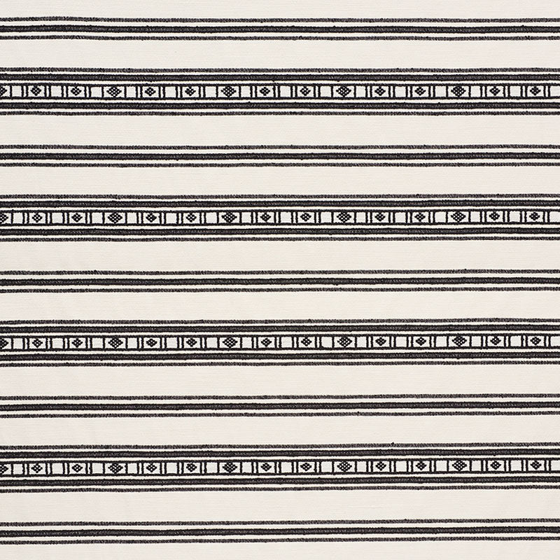 Cream fabric featuring black horizontal stripes and a repeating geometric border motif.
