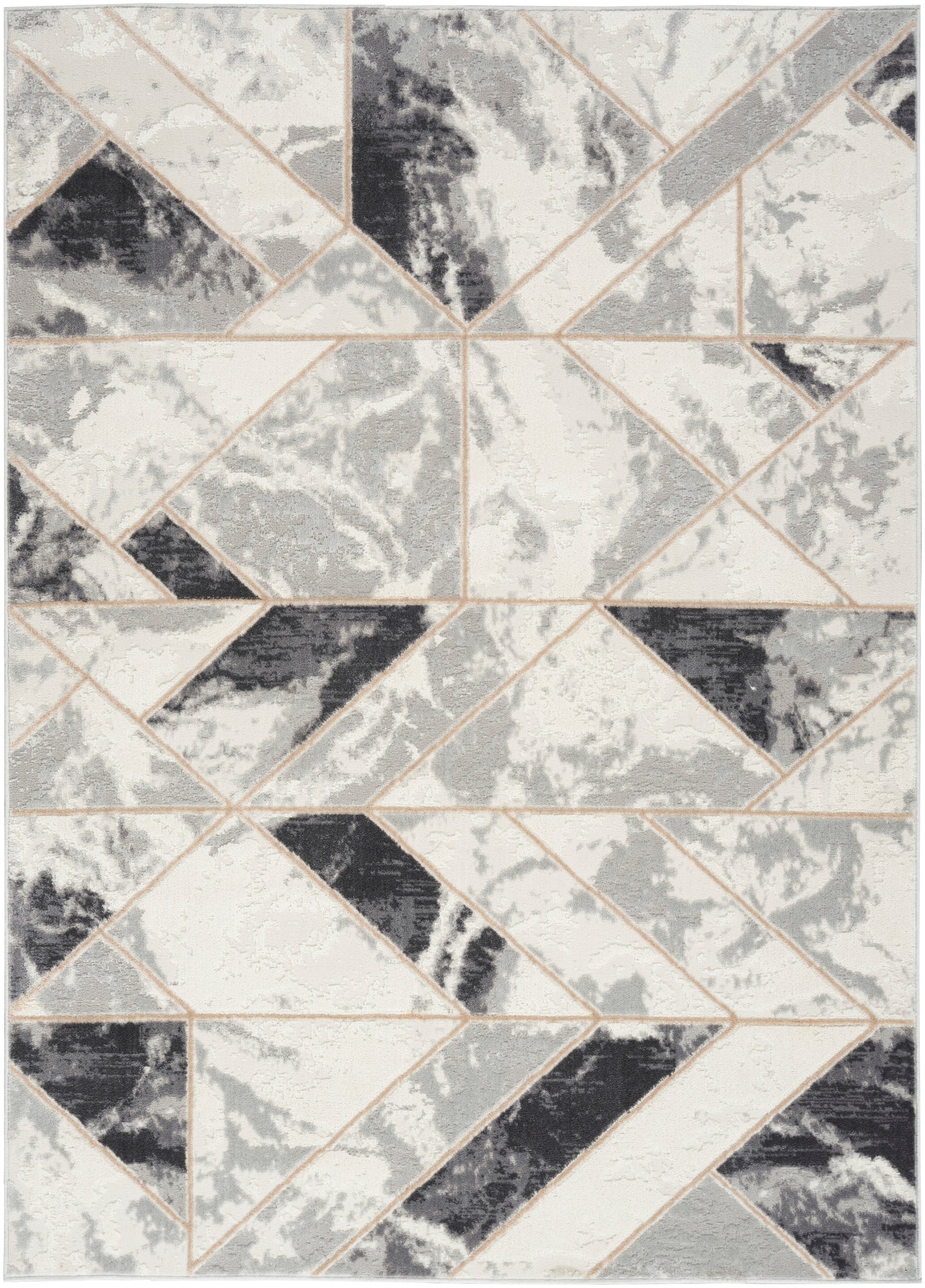 Geometric triangle patchwork rug in grayscale with beige seam lines; modern abstract style.