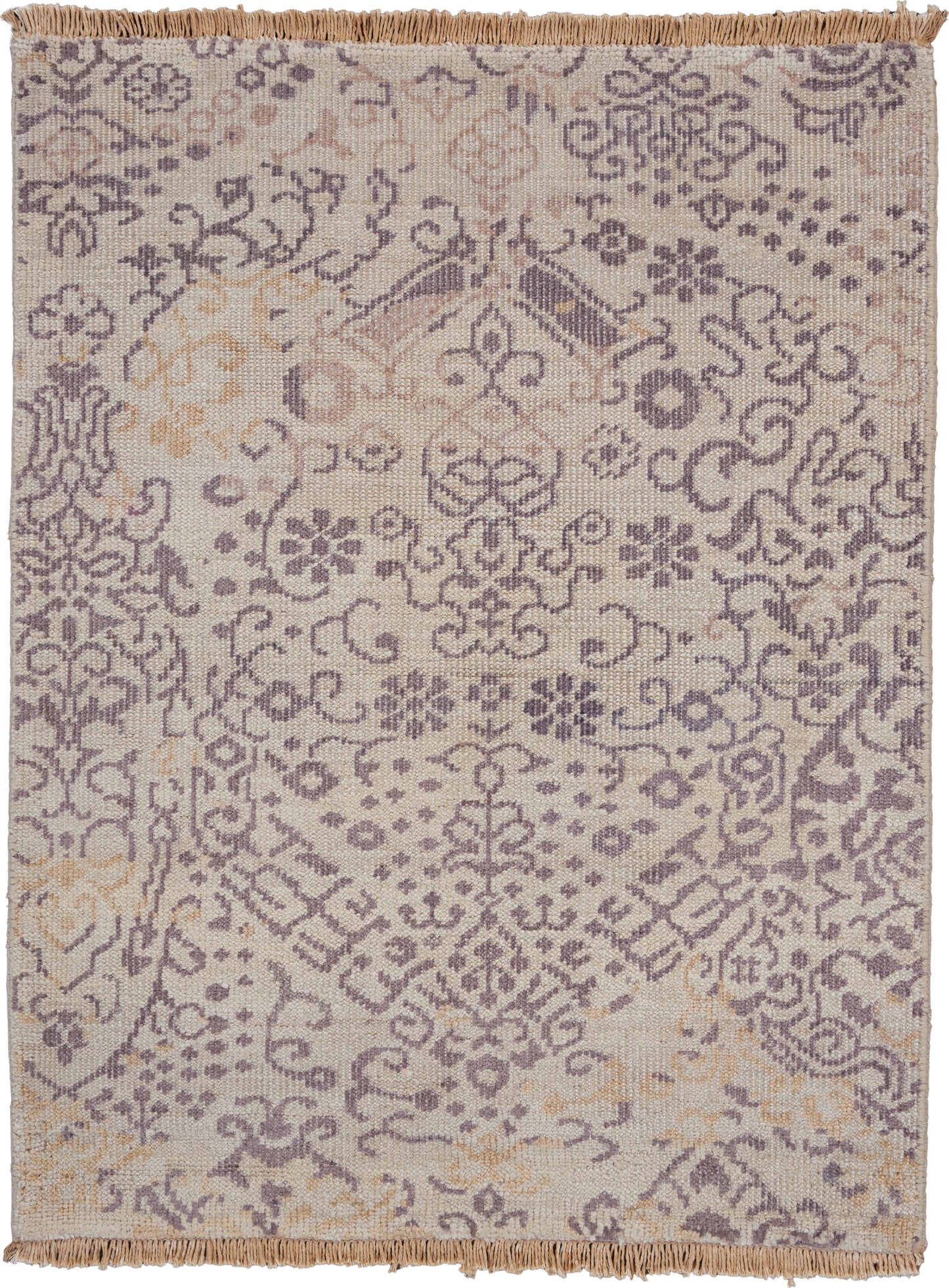 Beige rug with lavender damask floral pattern and fringed edges.