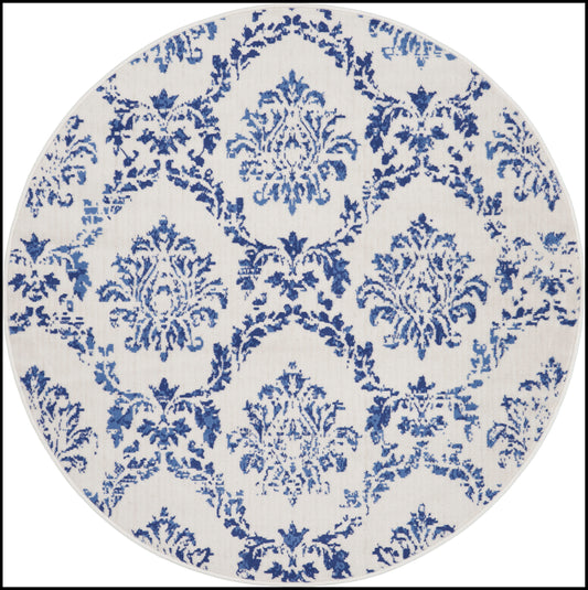 Round rug with blue damask pattern on white background