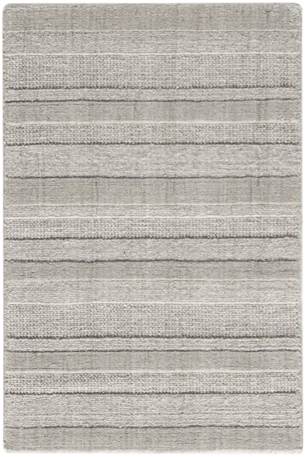 Light gray shag rug with plush texture and horizontal stripes; rectangular, modern living room decor.
