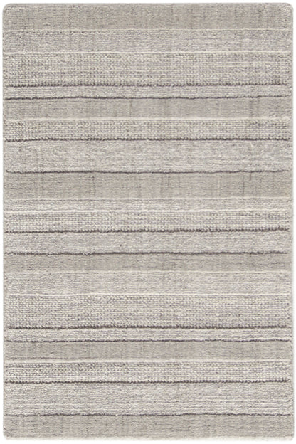 Light gray shag rug with plush texture and horizontal stripes; rectangular, modern living room decor.