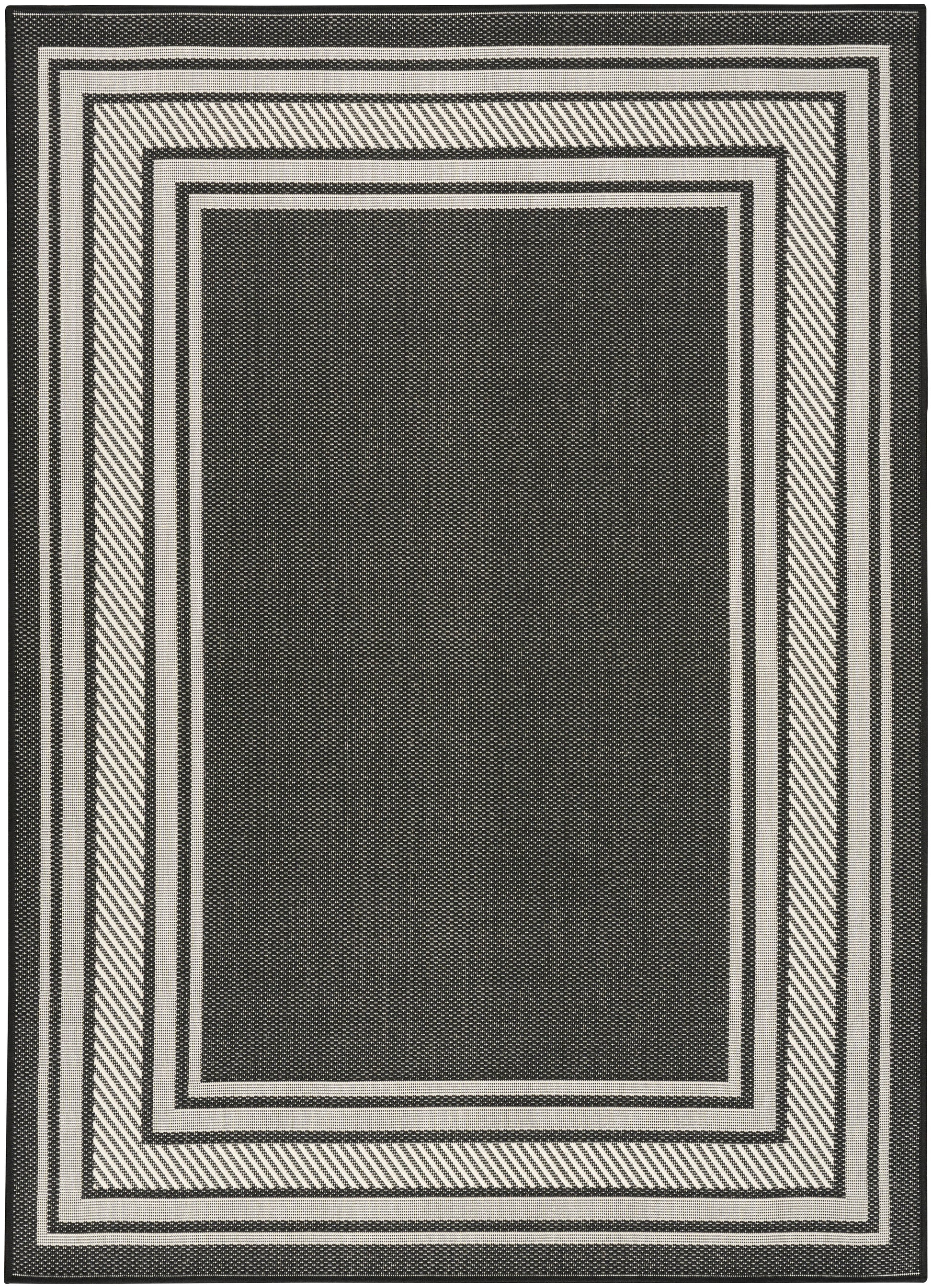 Rectangular rug with black center and ivory concentric borders; modern geometric pattern, woven texture.