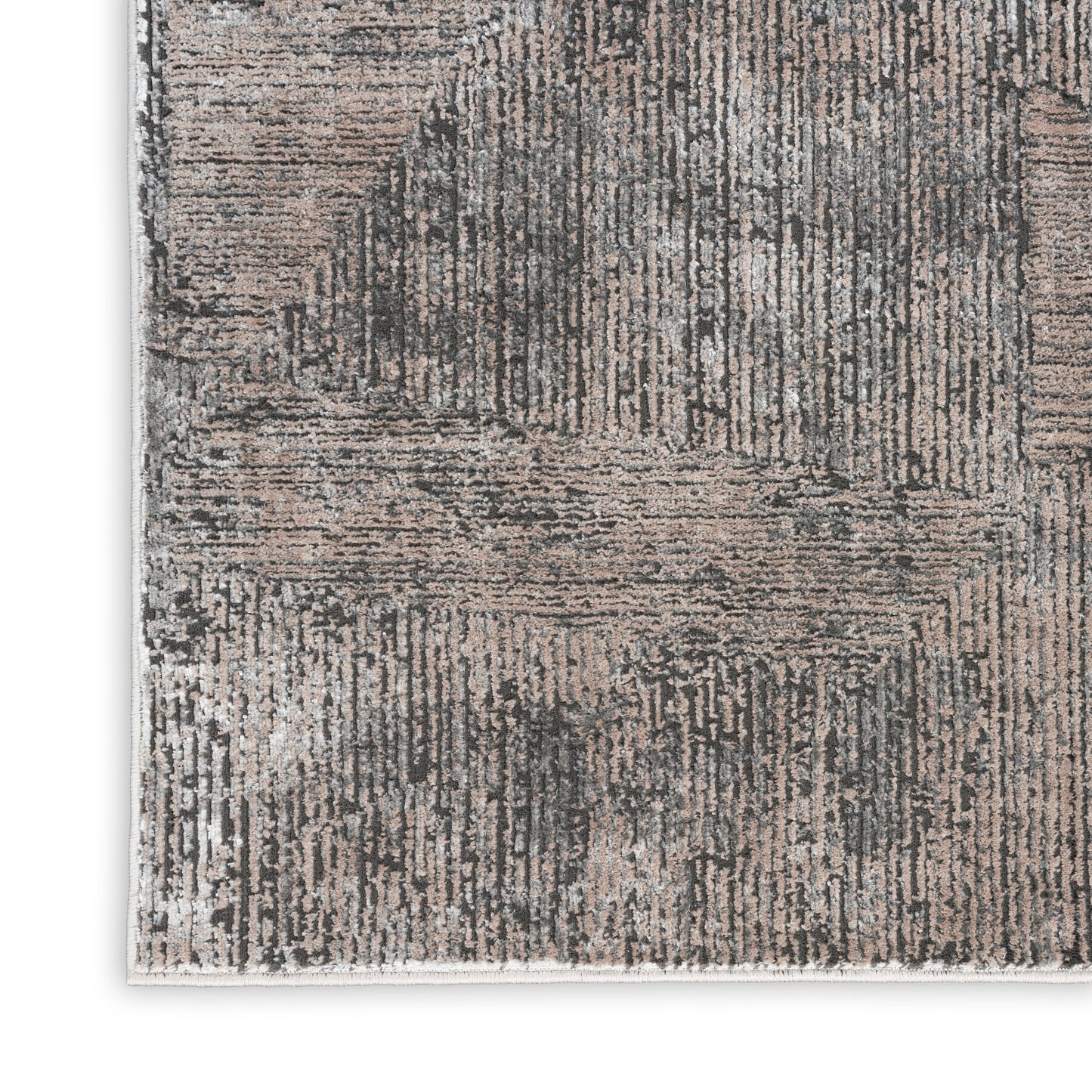 Rectangular gray and taupe area rug with a distressed abstract linear pattern and soft woven texture.