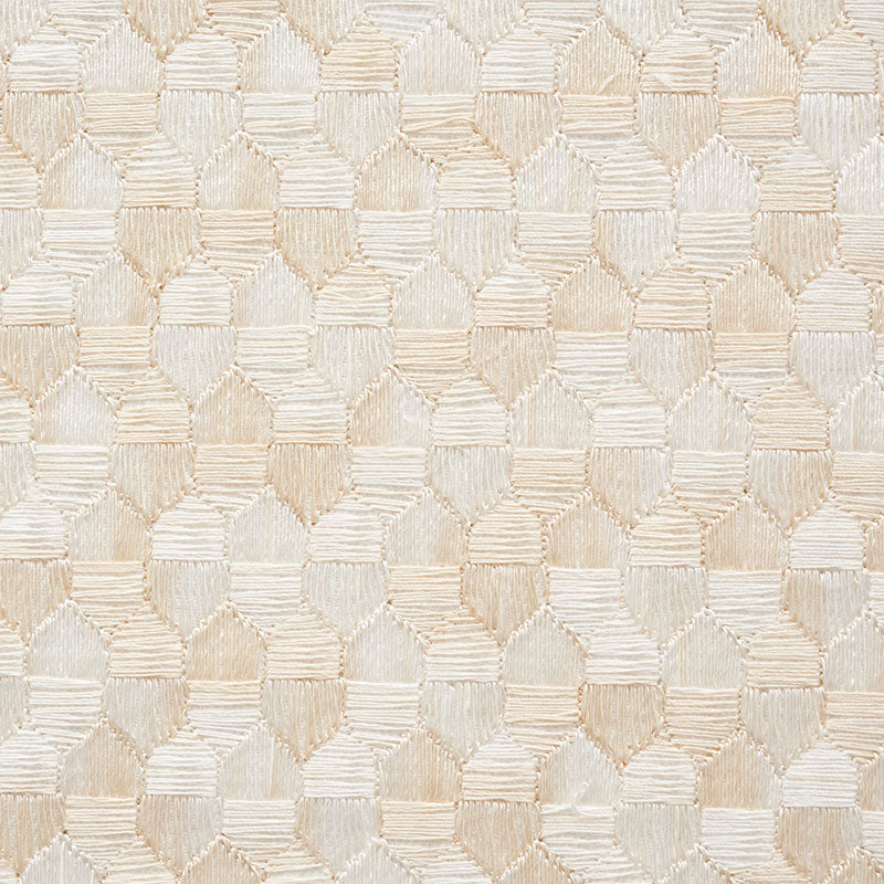 Ivory embroidery fabric with a geometric hexagonal pattern and subtle raised texture; ideal for upholstery or drapery.
