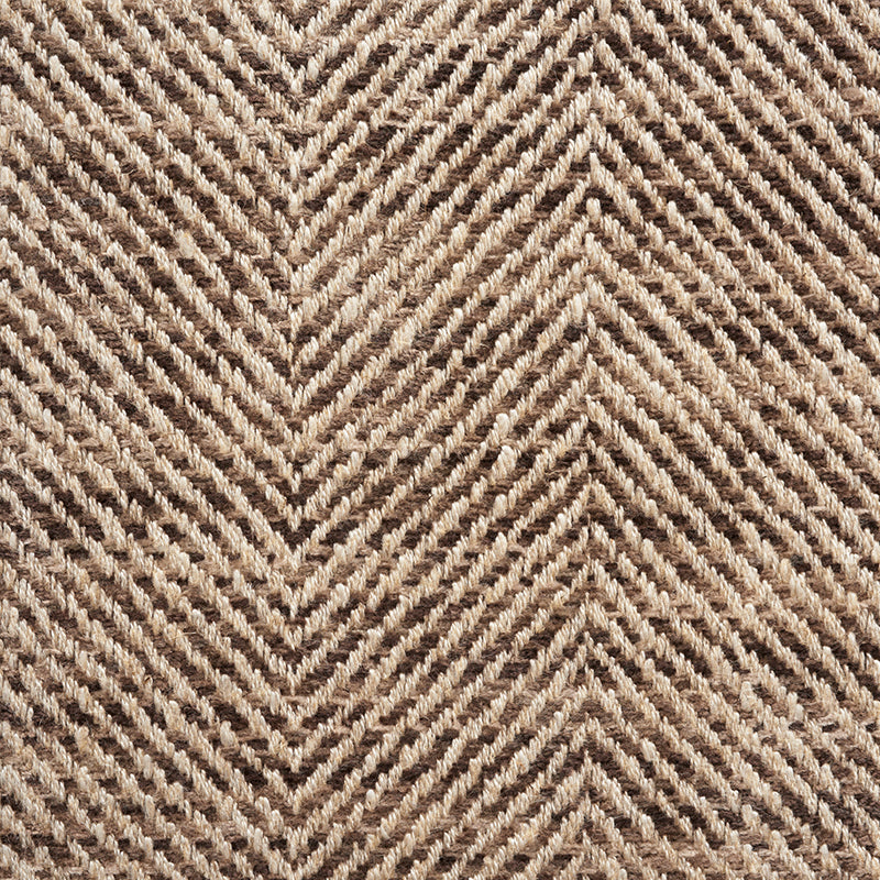 Beige and brown herringbone-pattern woven rug with thick, textured yarn and raised ridges.