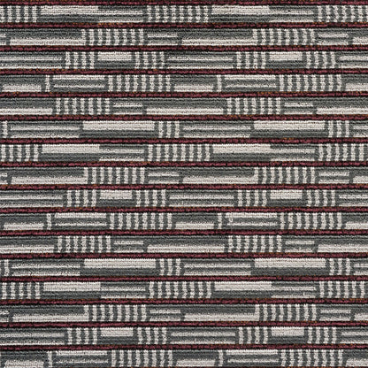 Geometric woven carpet tile in gray with maroon and white brick-like pattern, textured office hallway flooring.