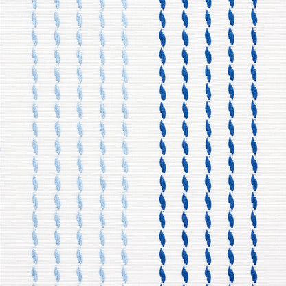 White textile with vertical braided rope stripes transitioning from pale blue to dark navy blue.