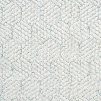 Light blue and white woven textile with a repeating geometric chevron/diamond pattern and subtle raised weave.