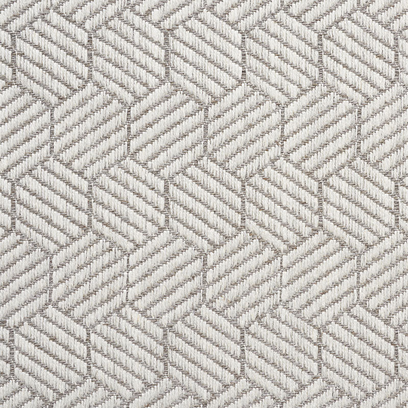 Beige-gray textured fabric with an interlocking hexagon pattern of diagonal ridges; a woven upholstery textile.