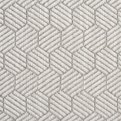 Beige-gray textured fabric with an interlocking hexagon pattern of diagonal ridges; a woven upholstery textile.