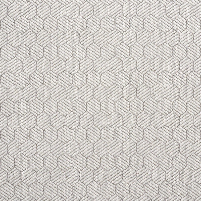 Beige fabric with a repeating hexagonal geometric pattern and subtle stitched texture.