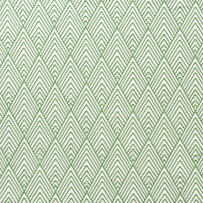 Green and white diamond chevron fabric pattern, repeating geometric motif.