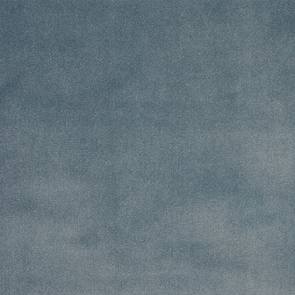 Blue textured fabric swatch with a denim-like weave and soft gradient shading.