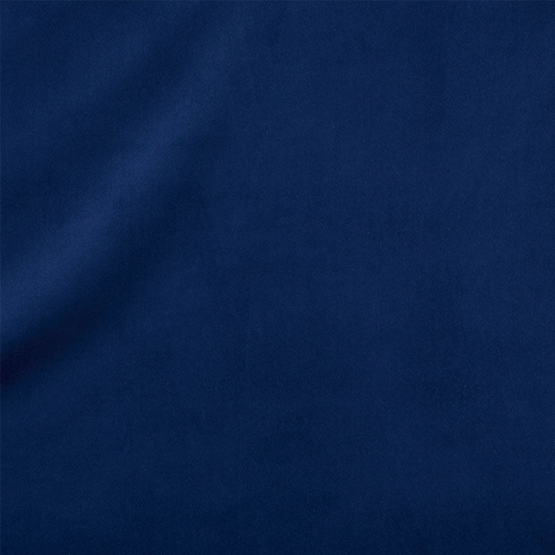 Navy blue velvet fabric swatch with smooth texture and subtle diagonal shadow.