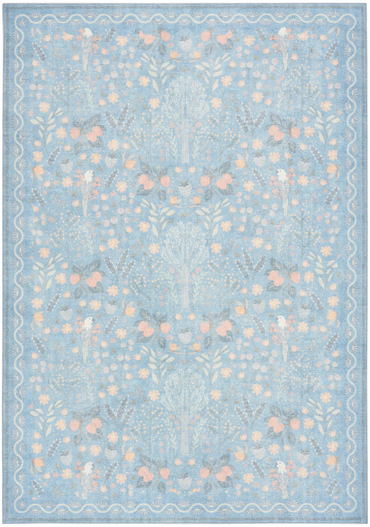 Soft blue area rug with pale pink floral and white damask pattern, bordered by a white wavy edge.