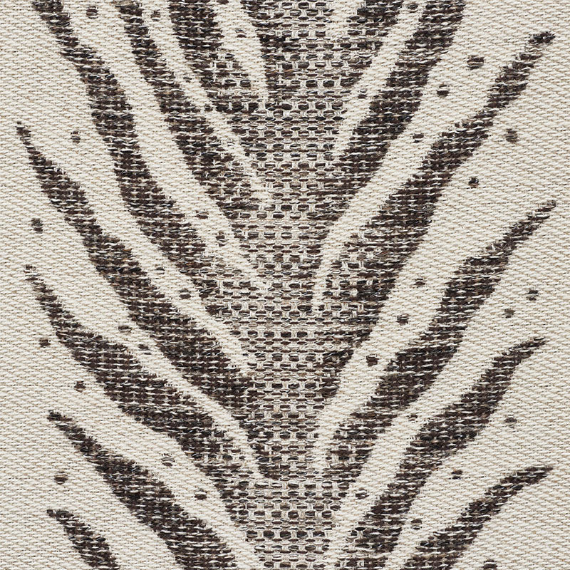 Zebra-print brown and cream woven textile with textured surface; perfect for rug or throw.