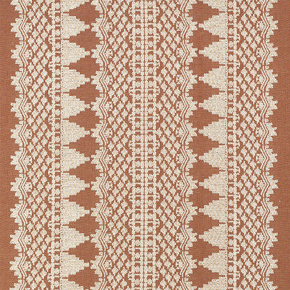Rust brown and cream woven textile with geometric tribal pattern and vertical stripes; boho upholstery fabric/throw.