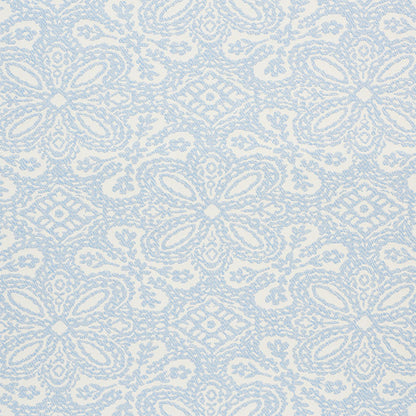 Light blue and white damask pattern fabric with ornate floral motifs.
