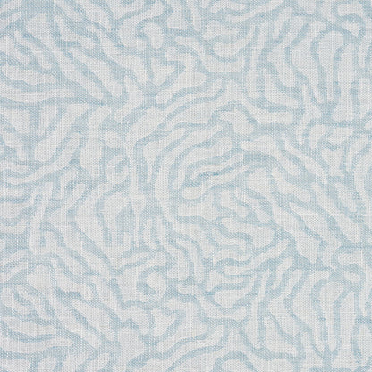 Light blue and white woven fabric with abstract zebra-like stripes for upholstery or decor.