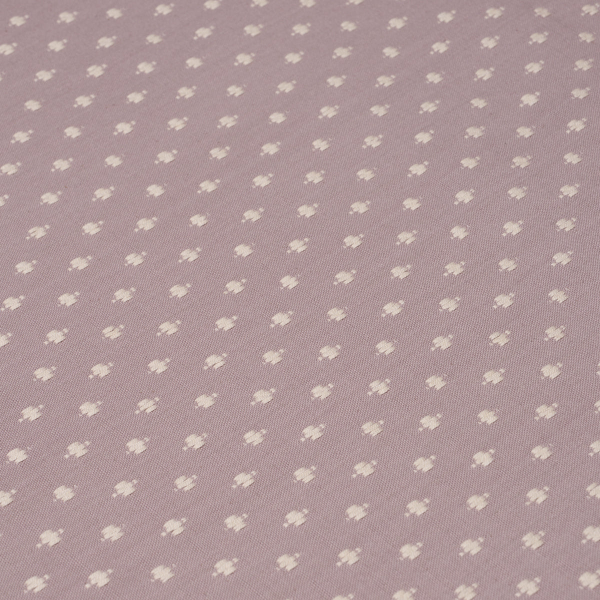 Lilac woven fabric; solid color.