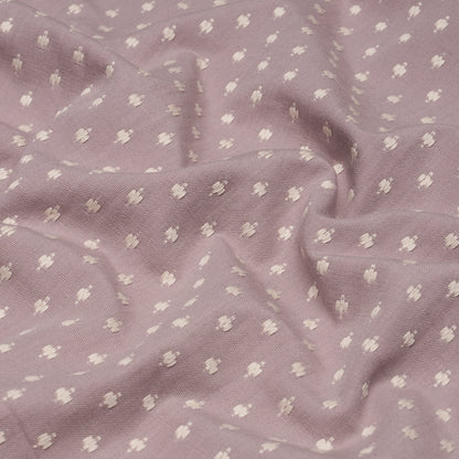 Lavender dotted Swiss cotton fabric with tiny white dots; soft, breathable, ideal for dresses.