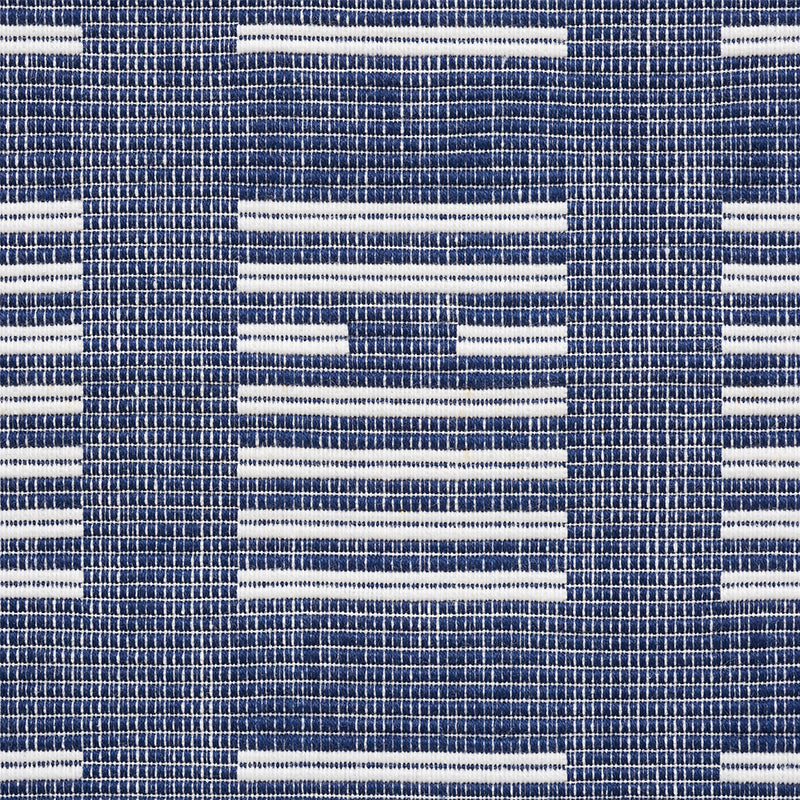 Blue and white woven fabric with repeating rectangular bars in a grid pattern; upholstery textile.