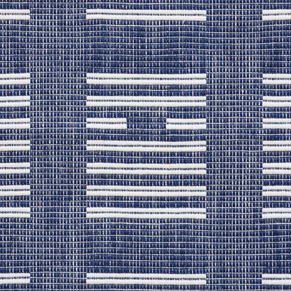 Blue and white woven fabric with repeating rectangular bars in a grid pattern; upholstery textile.