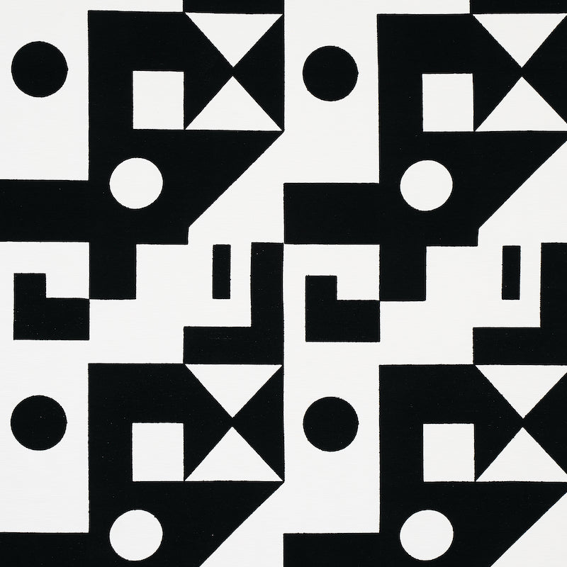 Black and white geometric tile pattern with squares, circles and triangles in a repeating modular grid.