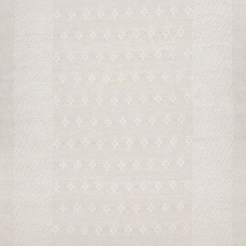 Beige woven rug with subtle repeating floral motif and textured borders; soft, neutral, versatile home decor.