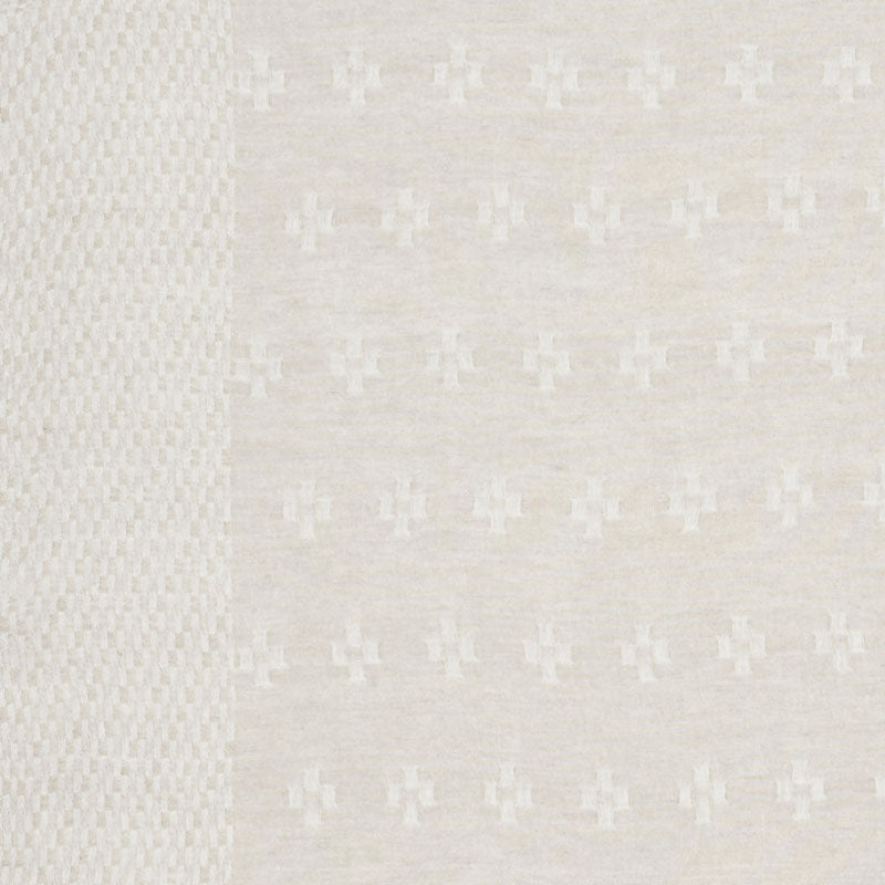 Cream woven fabric with a left textured grid panel and subtle cross motifs across the main area.