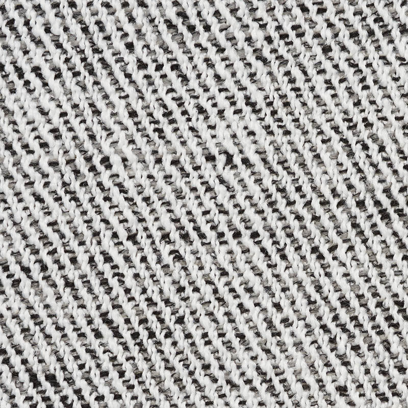 Close-up of charcoal twill fabric with subtle gray and white speckles and a diagonal weave texture.