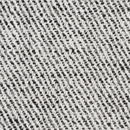Close-up of charcoal twill fabric with subtle gray and white speckles and a diagonal weave texture.