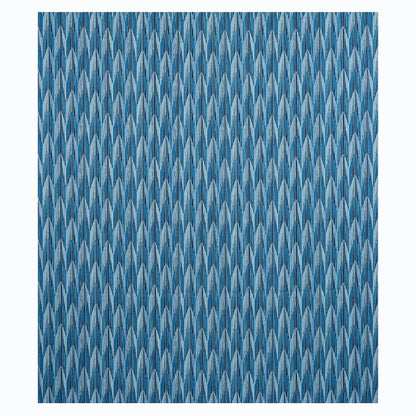 Blue woven fabric with a repeating diagonal chevron pattern; textured upholstery material.