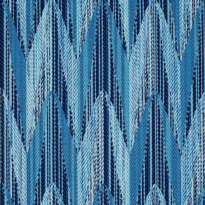 Blue chevron pattern woven fabric with a textured weave in light and dark blue tones.