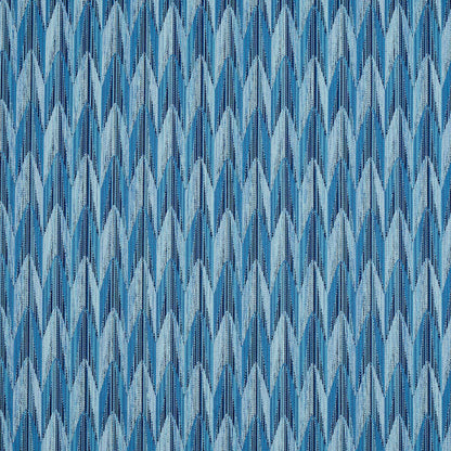 Denim-like blue chevron pattern fabric texture with light and dark indigo tones.