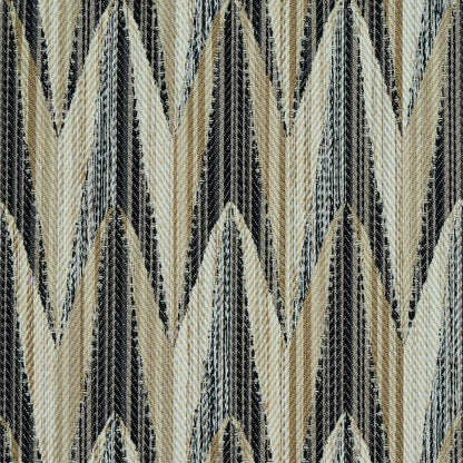 Textured woven fabric in beige, cream and black chevron zigzag pattern; geometric indoor/outdoor pattern woven textile.