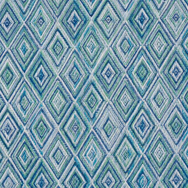 Woven fabric with teal, blue and aqua diamond geometric pattern; textured upholstery or throw pillow textile.