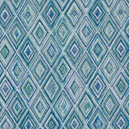 Woven fabric with teal, blue and aqua diamond geometric pattern; textured upholstery or throw pillow textile.