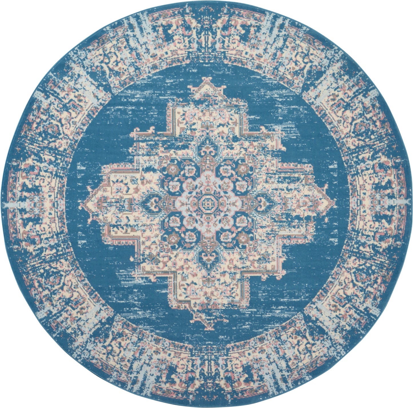 Round blue rug with cream distressed Persian medallion pattern and decorative border, vintage-style floor decor.