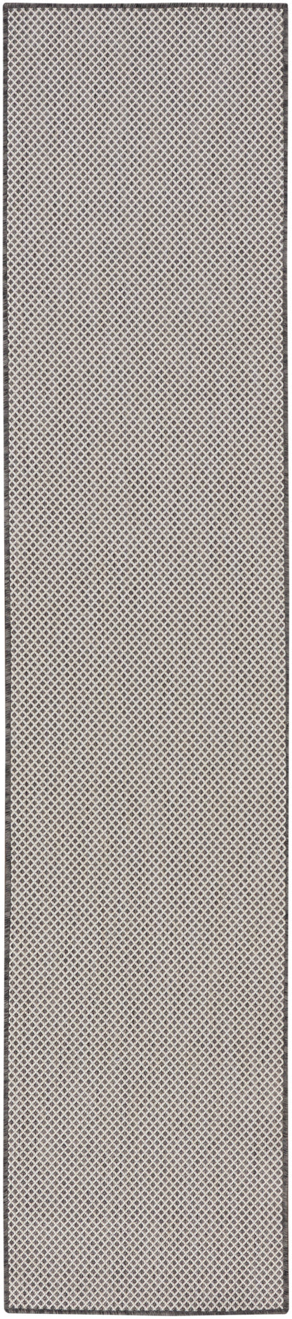 Beige 6' runner rug with repeating diamond lattice pattern and dark border.