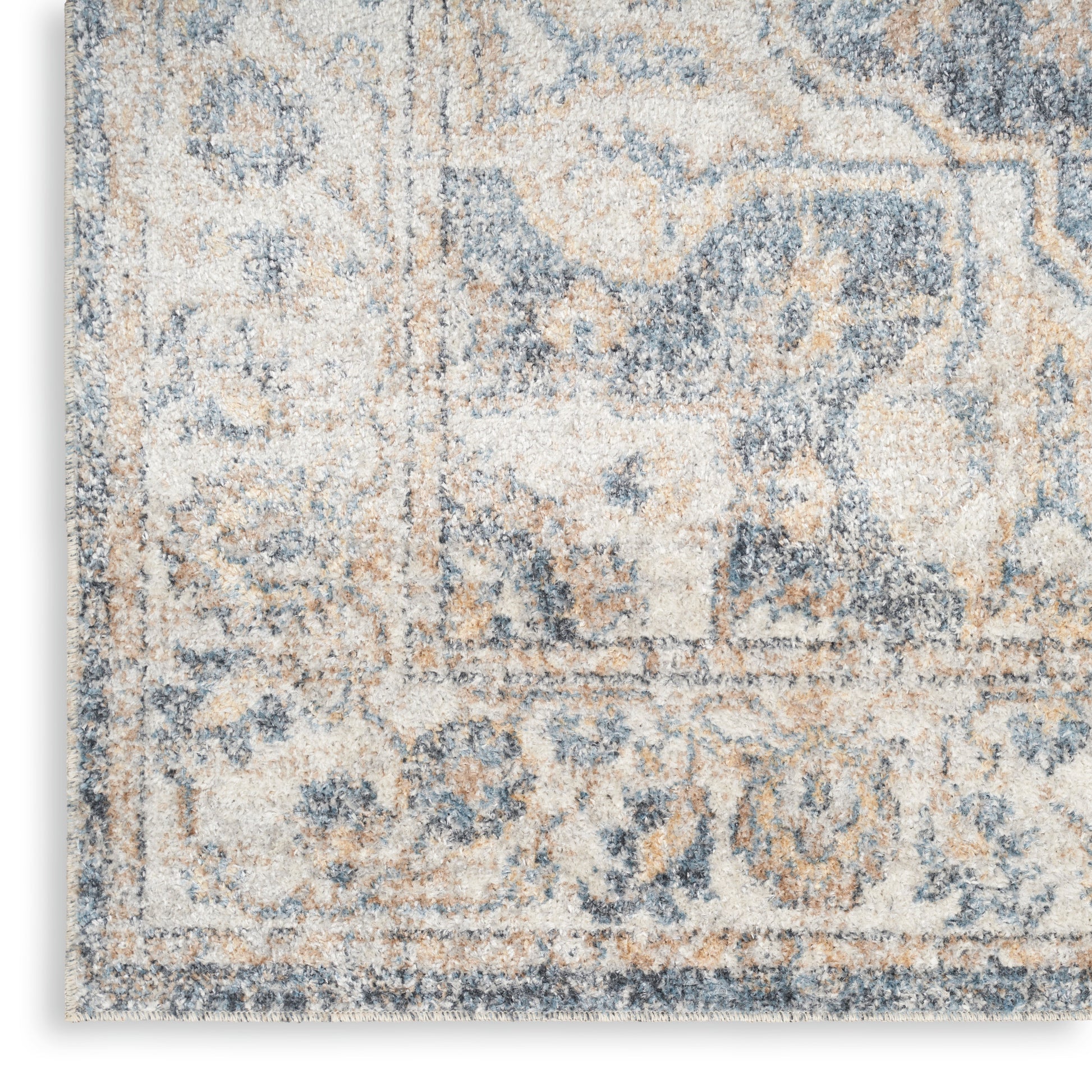 Rectangular rug with blue, beige and ivory distressed oriental pattern and plush pile.