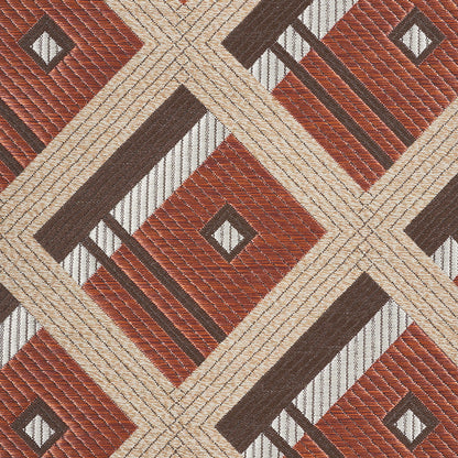 Woven geometric rug with rust, beige, cream and brown diamonds and intersecting lines; contemporary tribal style.