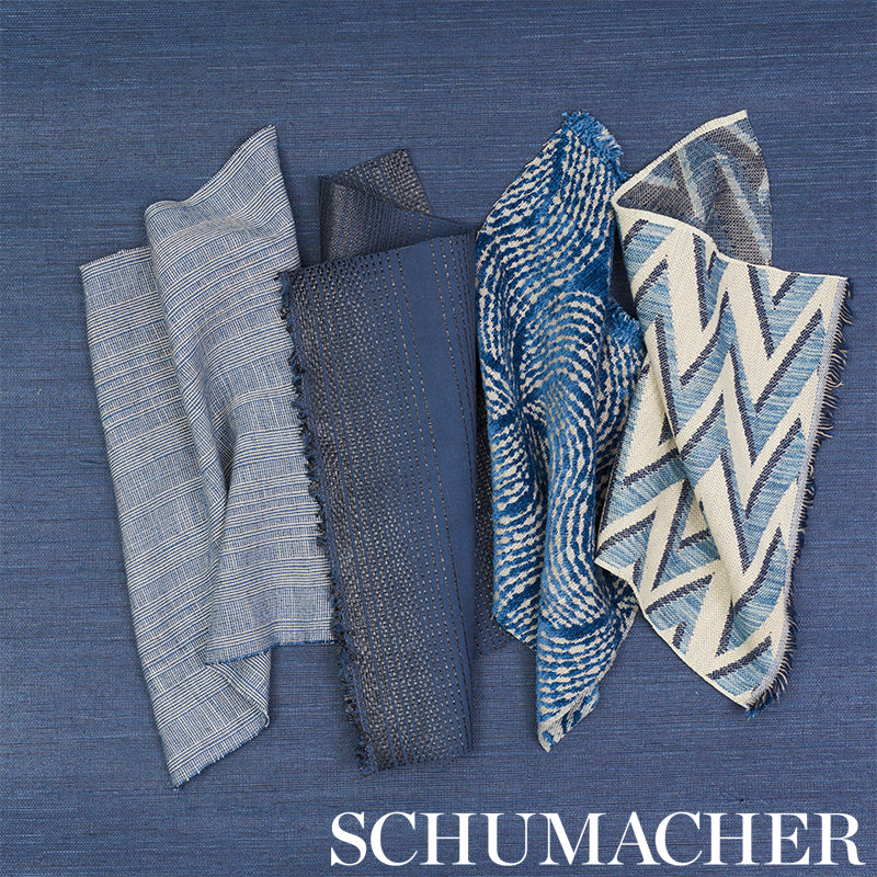 Blue fabric swatches in varied textures and patterns: stripes, dots, chevrons, waves on blue backdrop.