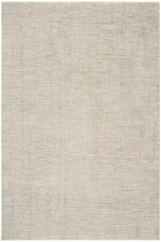 Beige rectangular area rug with a subtle distressed texture; soft, low-pile, neutral taupe tones.