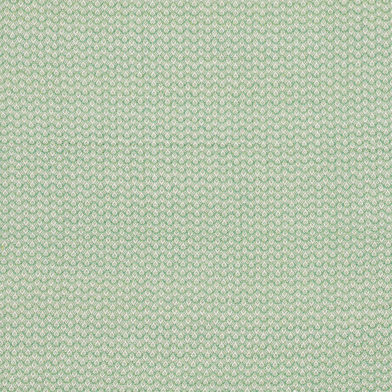 Sage green fabric with a leaf-pattern weave and subtle upholstery texture.