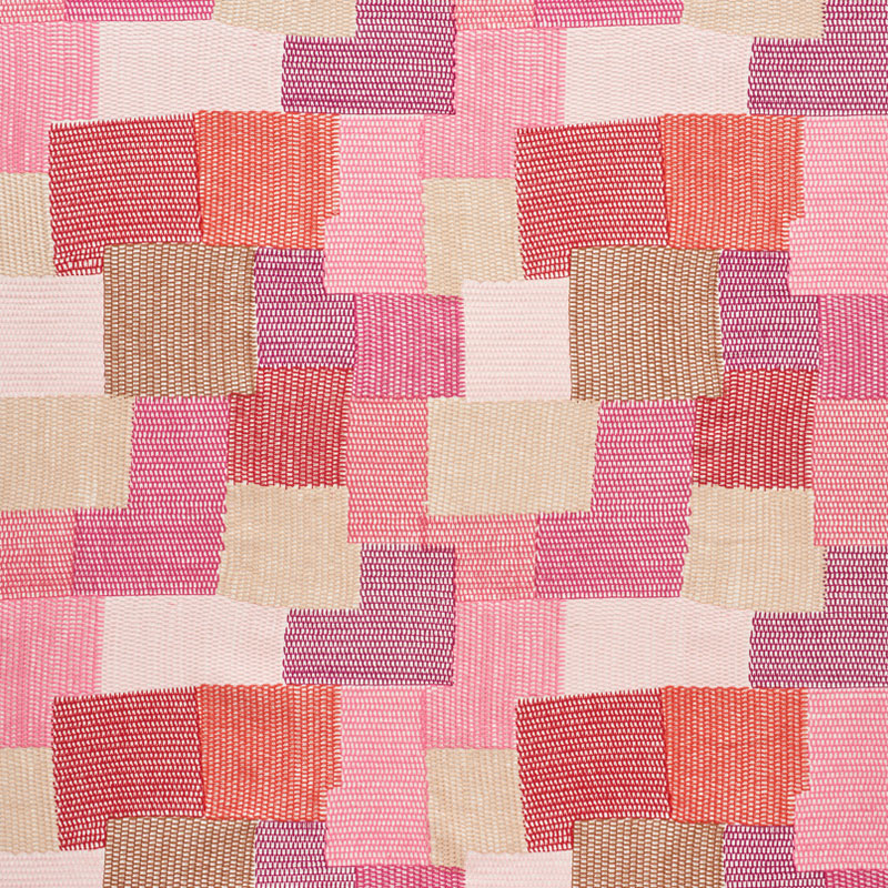 Patchwork woven fabric swatches in pinks, peach, lavender and cream with striped textures and square blocks.