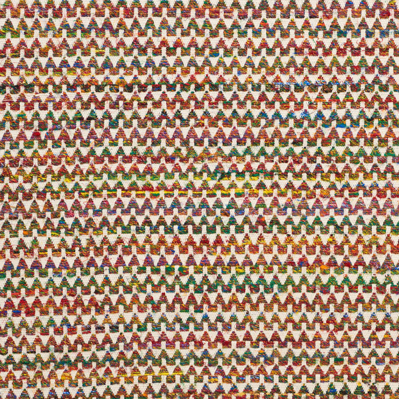 Colorful woven fabric featuring tiny multicolor triangles in horizontal rows on a light background.